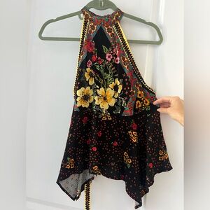 Free people black top with colorful floral pattern and strappy open back